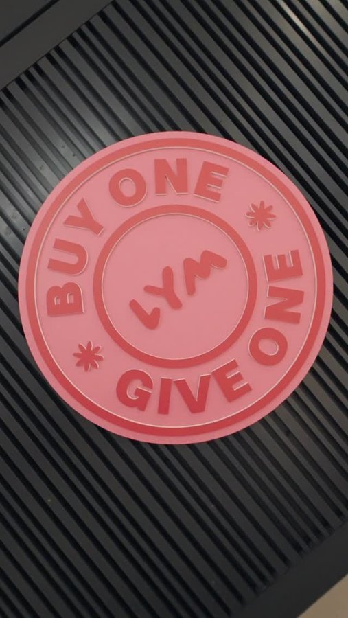 Instagram post by @buildyourownbeanie for Love Your Melon. Caption reads: Join us for our Grand Opening Party for the Love....