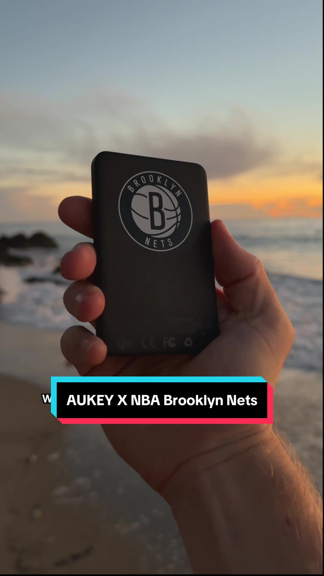 TikTok post by @worldpins for Aukey. Caption reads: Unboxing the AUKEY MagFusion wireless charging....