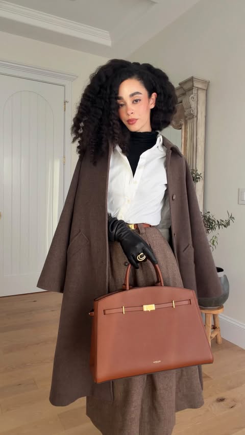 Instagram post by @shannbailee for Sezane. Caption reads: Let’s get dressed! Styling the most gorgeous skirt....