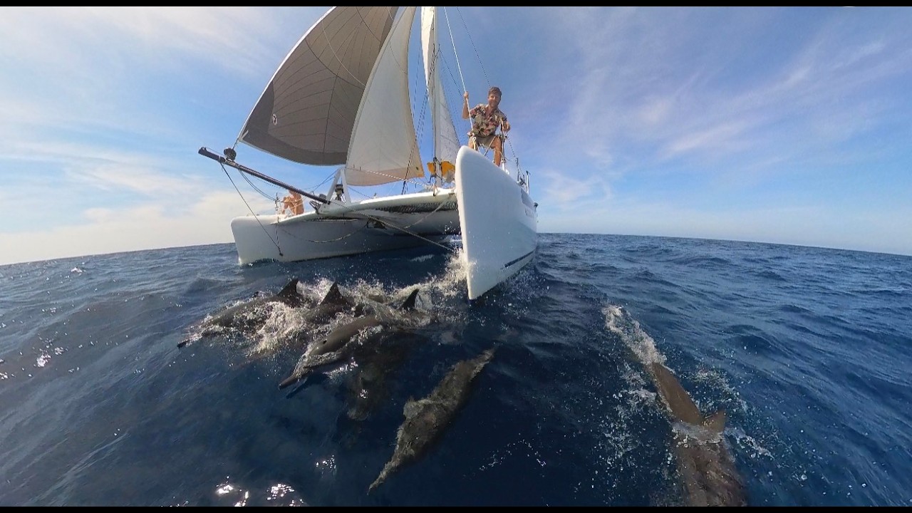 YouTube post by @samholmessailing for Cash App Studios. Caption reads: 500 Nautical Mile Offshore Passage in Catamaran.