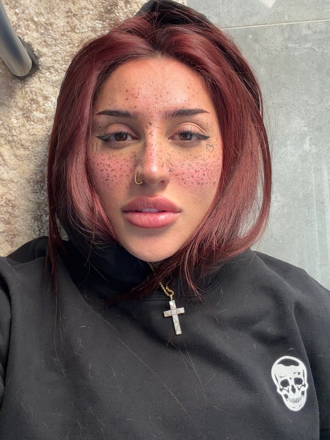 Instagram post by @bakharnabieva for Gymreapers. Caption reads: New merch. Big discounts. Up to 50% off, starting....