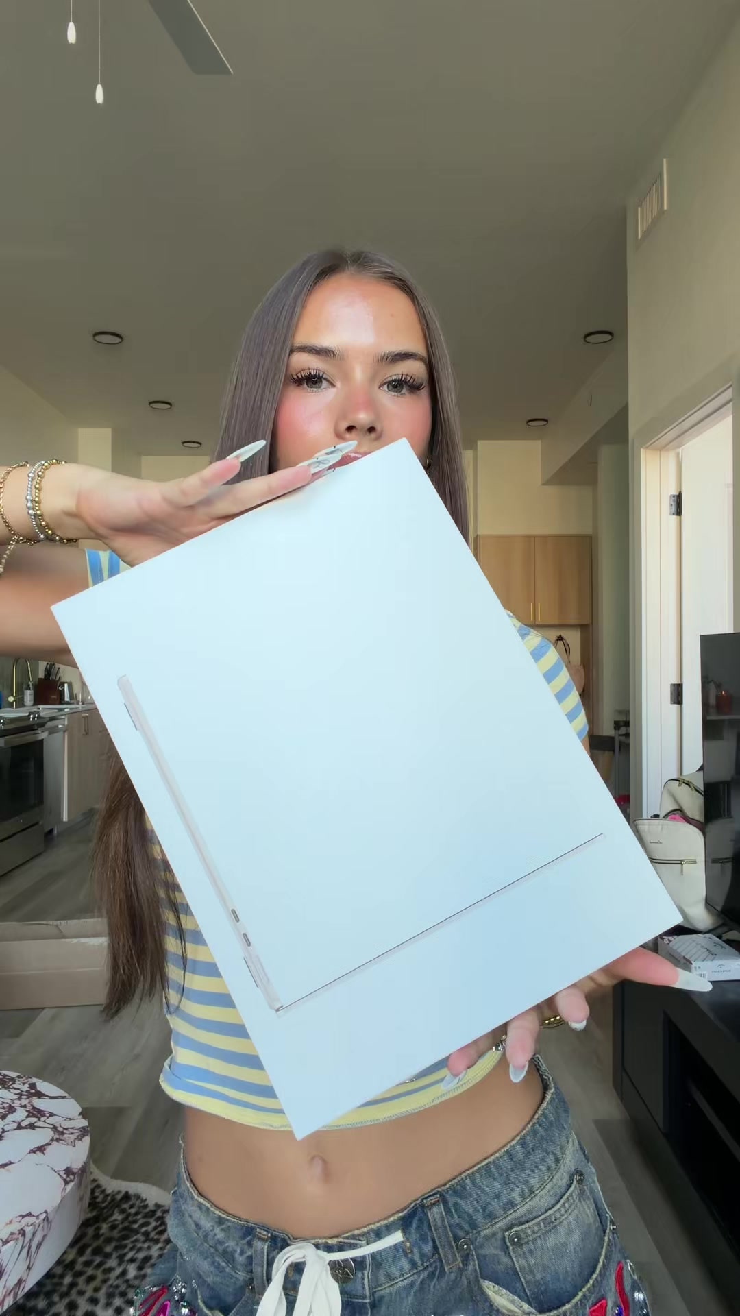 TikTok post by @only1aliya for Amazon Influencer ID. Caption reads: MY FAV LAPTOP, MacBook Air with M5....