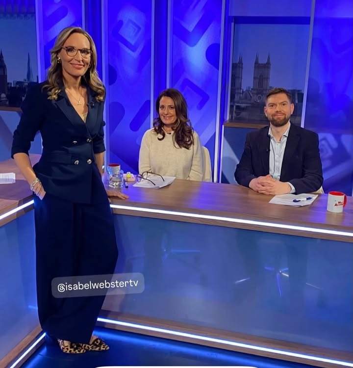 Instagram post by @isabelwebstertv for Karen Millen. Caption reads: Well hello 2026! 
That was a lot of fun....