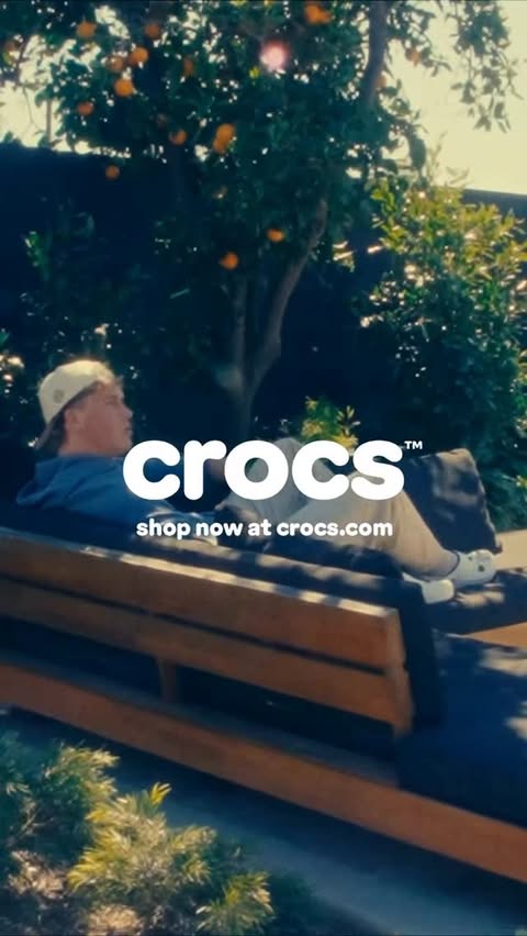 Instagram post by @jaxsondart for Crocs. Caption reads: Holidays locked in. @crocs On. #CrocsPartner.