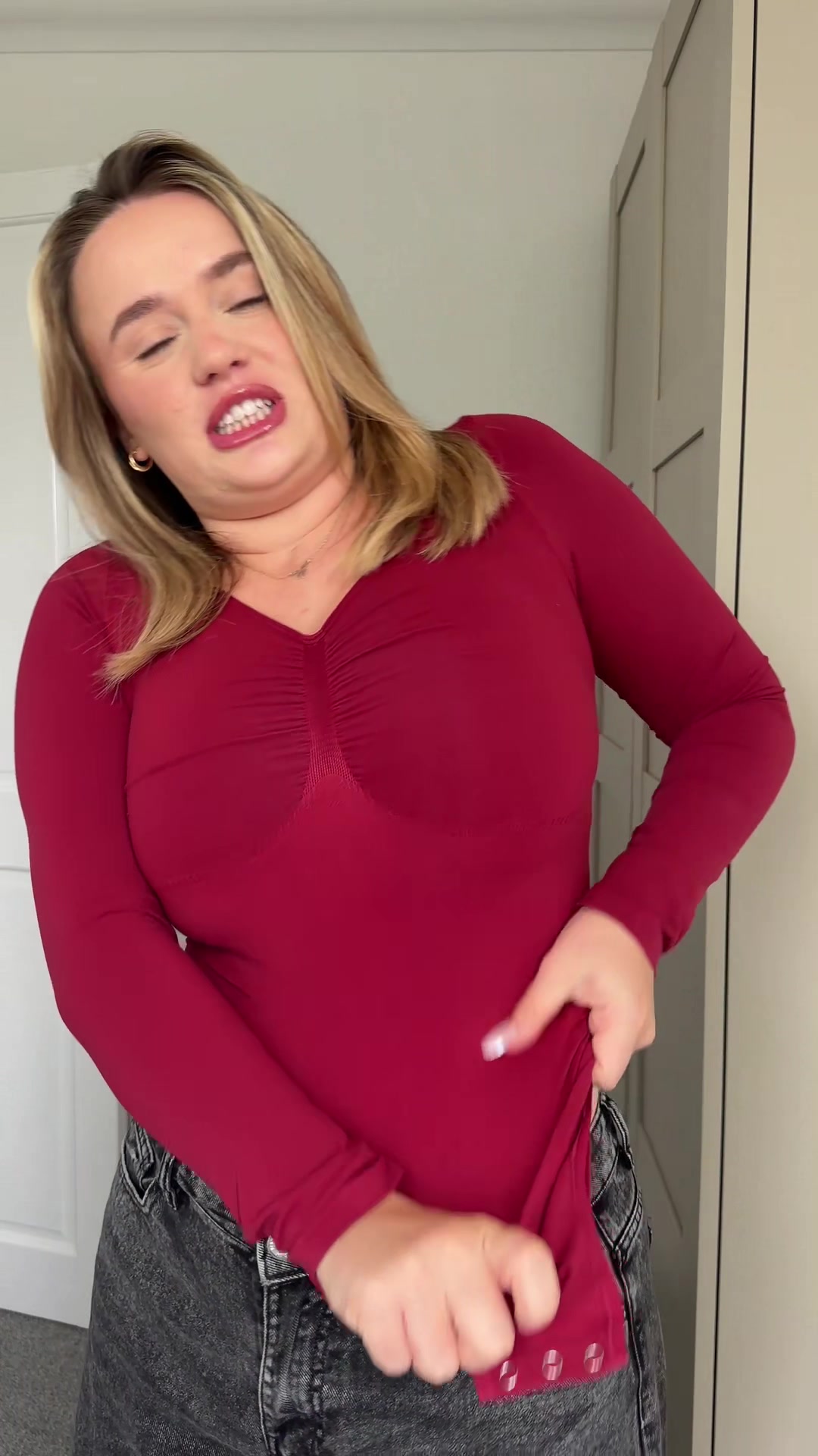 TikTok post by @larlelock for FeelinGirl-UK. Caption reads: The most flattering bodysuit EVER!! ⏳....