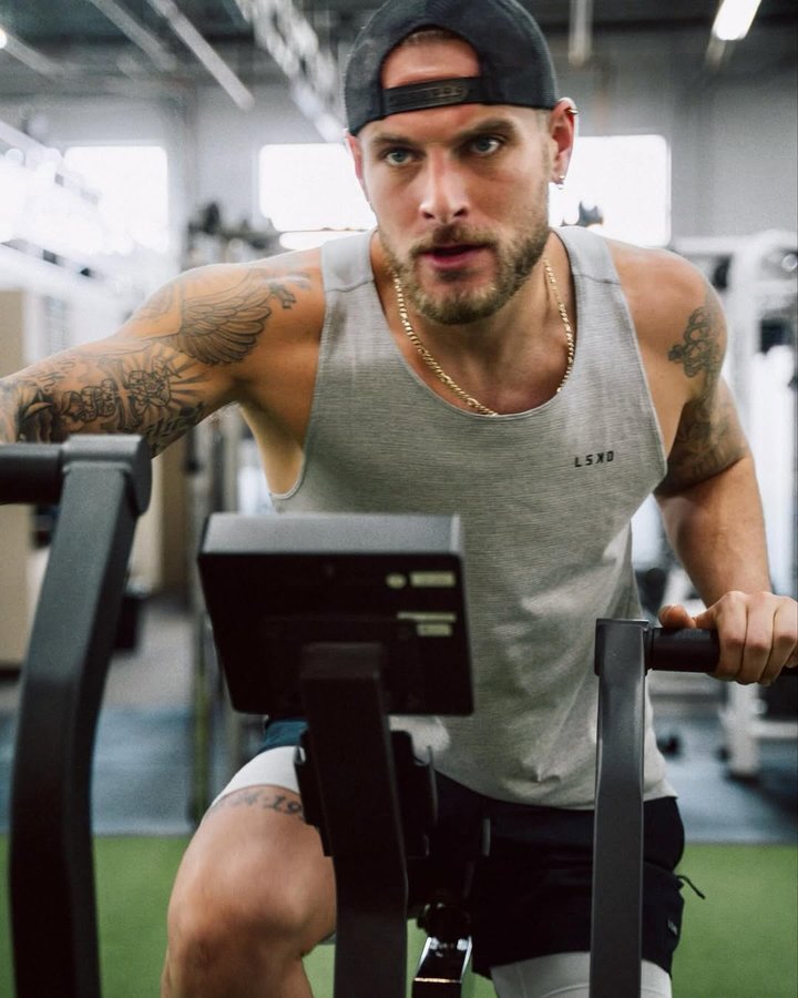 Instagram post by @derektpratt for TRIFECTA. Caption reads: Intensity on the bike, determination in my veins.....