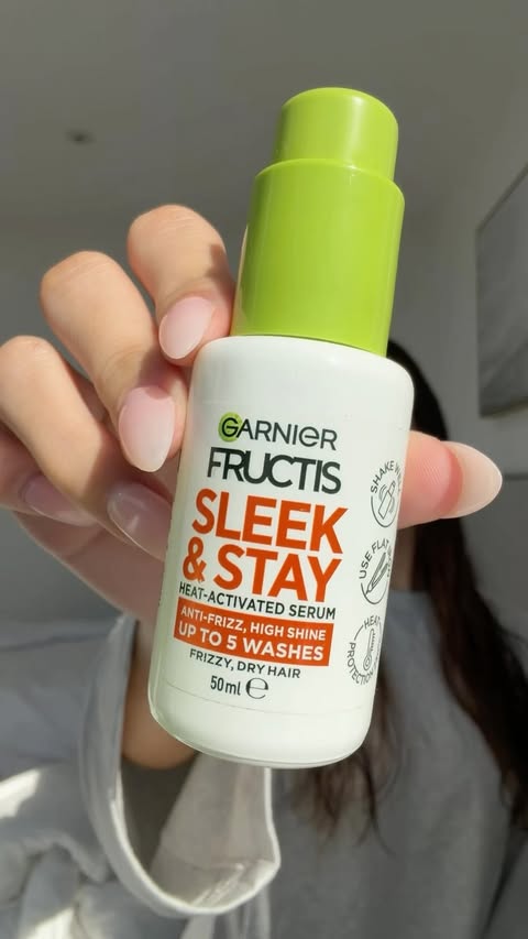 Instagram post by @ambergeritz_ for Garnier AU & NZ. Caption reads: [...] want sleek hair you need to try the....