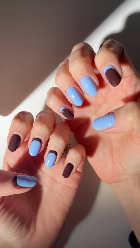 Instagram post by @nail.betch for essie. Caption reads: Simple 2 tone nail art ✨
Both shades from @essie....