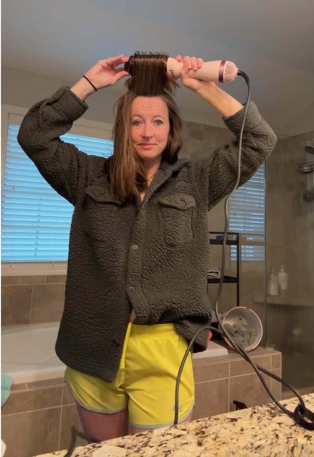 TikTok post by @rascalwrangler for L’ange Hair. Caption reads: My @langehair is still the goat! So quick and easy....