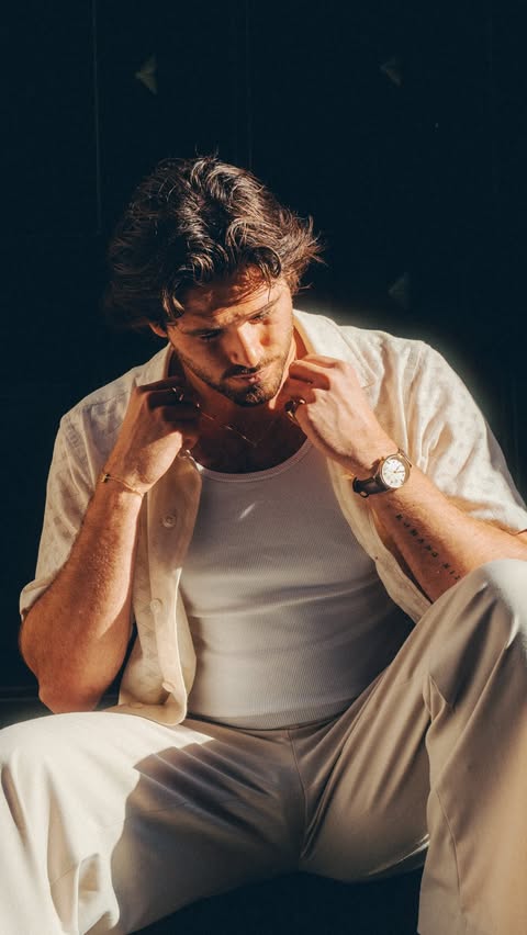 Instagram post by @seb_reyneke_ for Trendhim. Caption reads: [...] gold jewelry and a little bit of sun.....