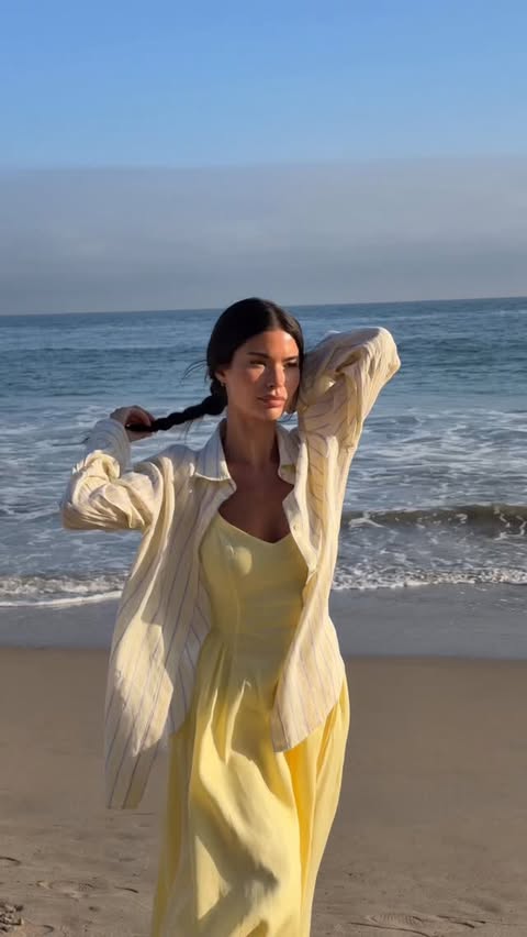 Instagram post by @aishapotter for Aritzia. Caption reads: 🧈🧈🧈 beach days @aritzia ad.
