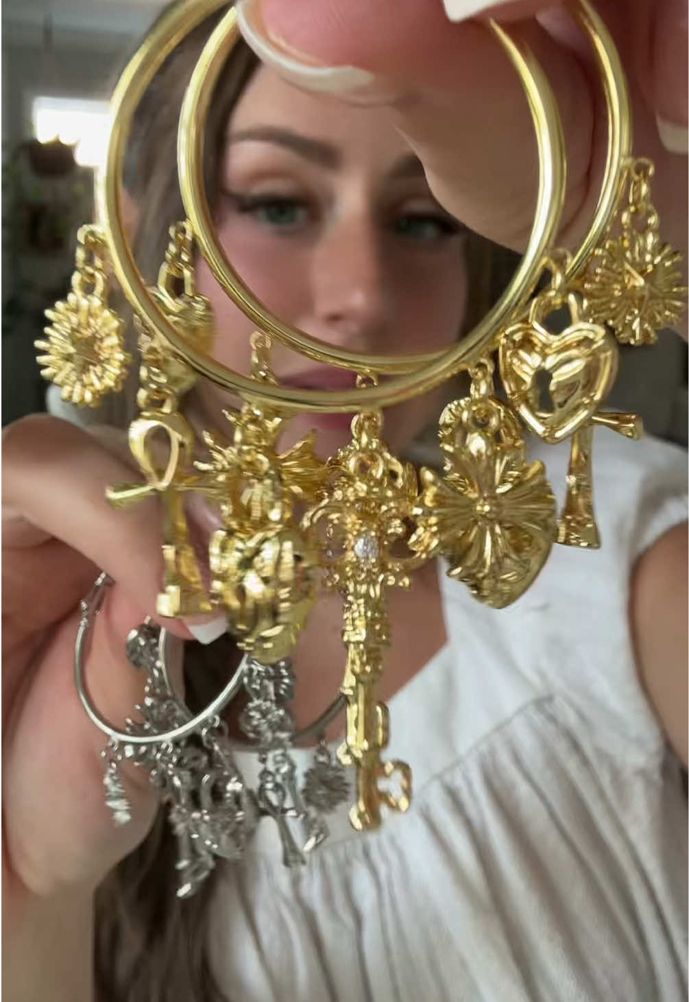 TikTok post by @rosymaplesloth for GANIA. Caption reads: [...] jewelry! So pretty and whimsical! ✨ @GANIA....