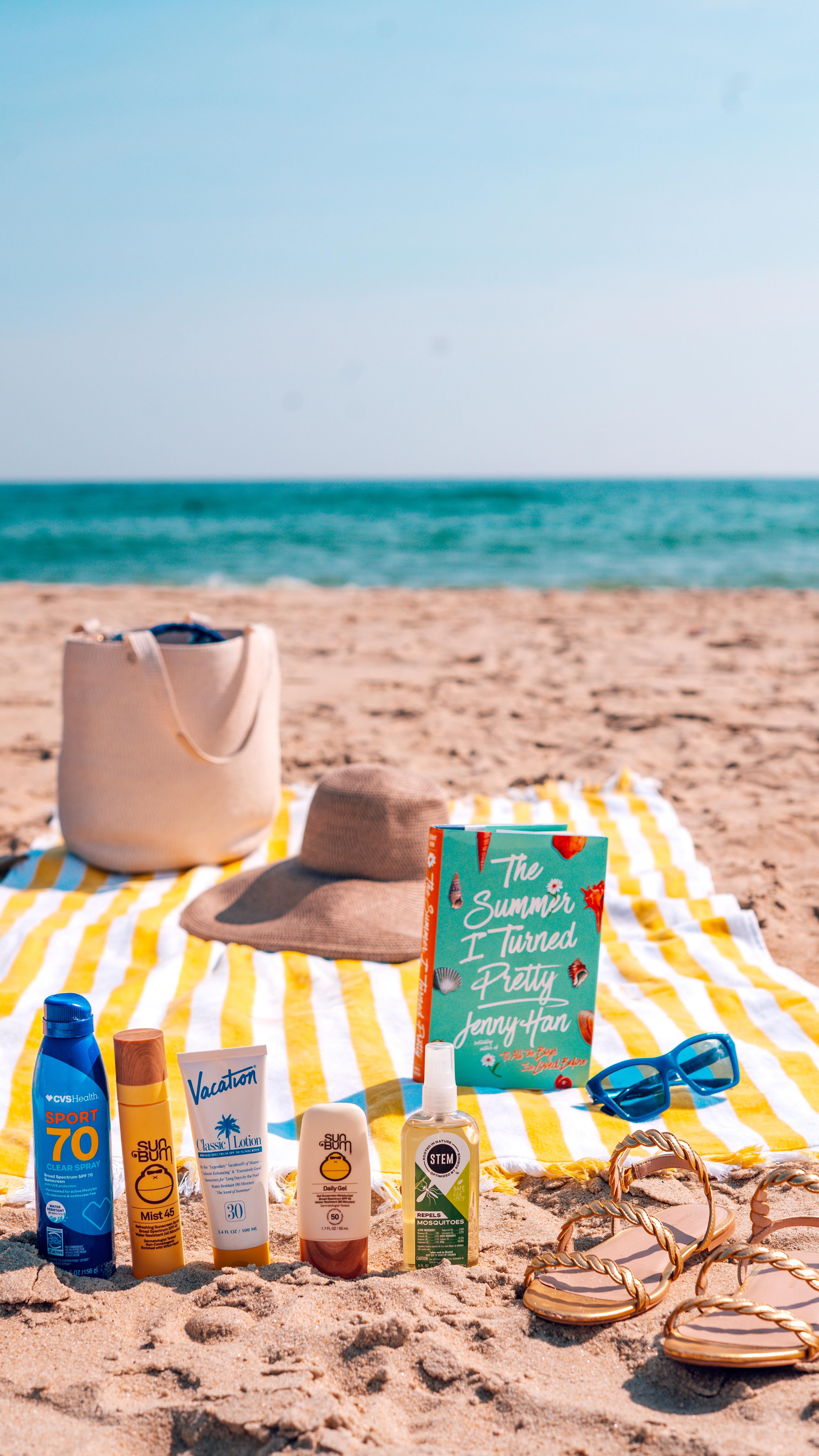 Instagram post by @twinspirationaltravels for Sun Bum. Caption reads: #ad Beach, please. We packed like pros. Our....