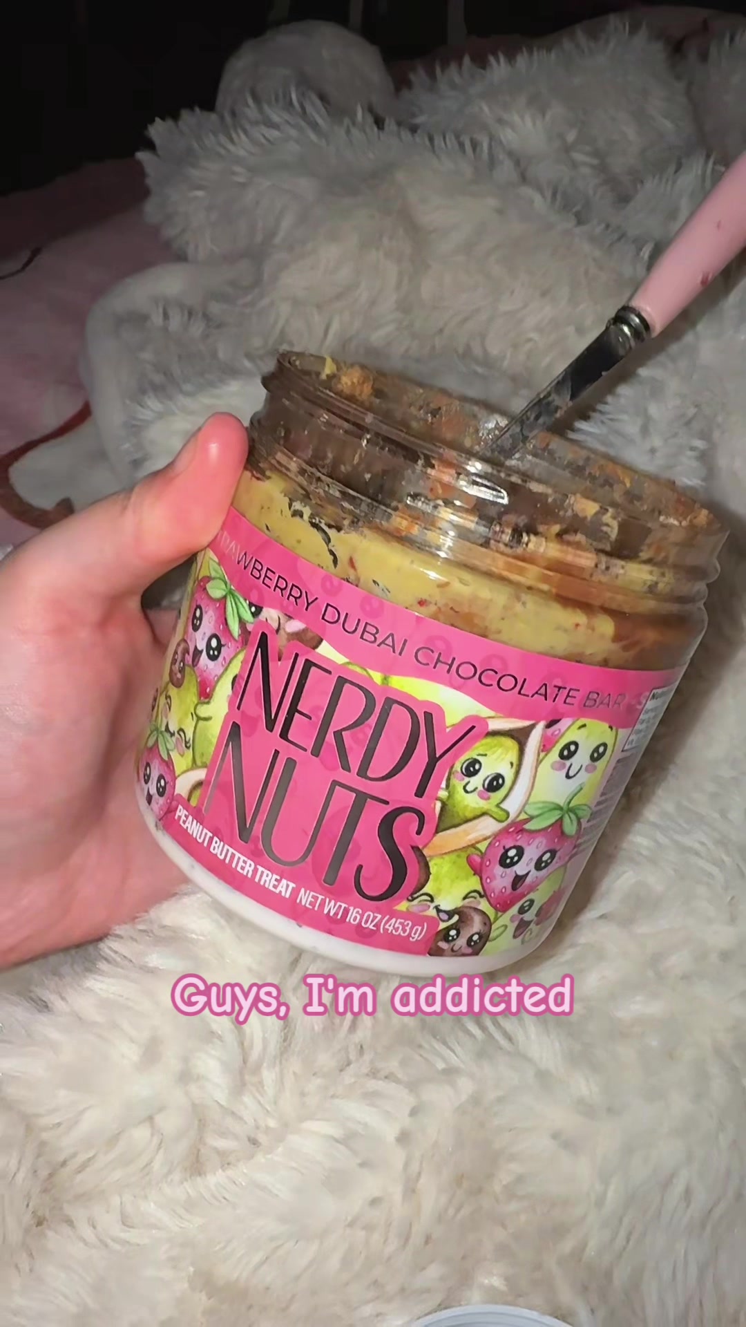 TikTok post by @phokyo for Nerdy Nuts. Caption reads: Strawberry Dubai Chocolate bar @Nerdy Nuts Shop....