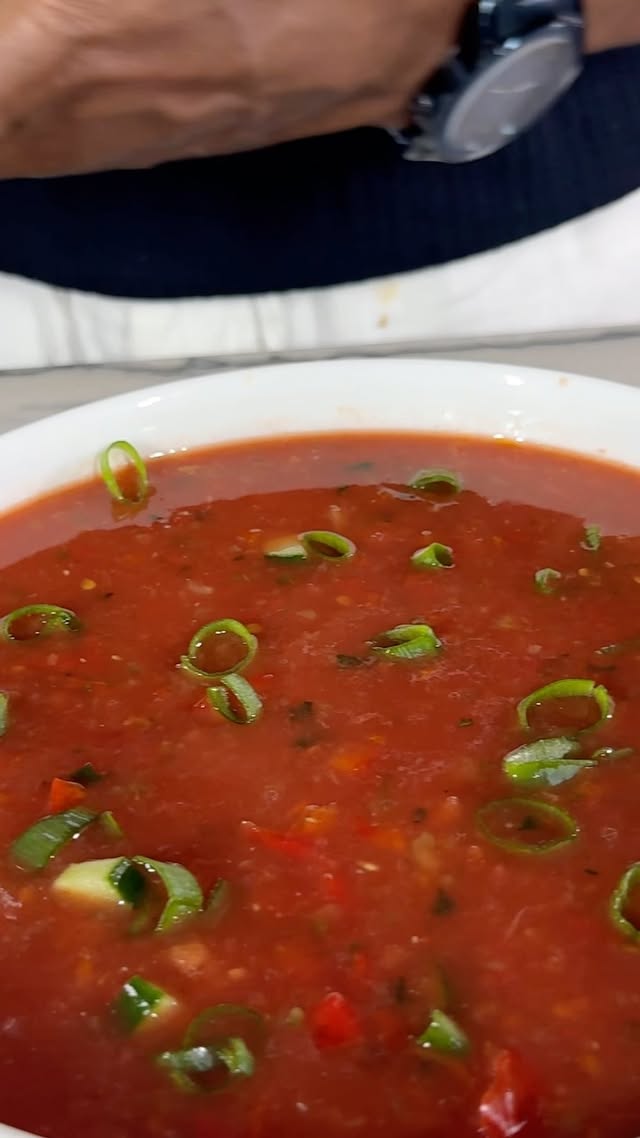 Instagram post by @healthyveganeating for Kuvings. Caption reads: [...] ⬇️ Quick Gazpacho #ad I am using my KUVINGS....