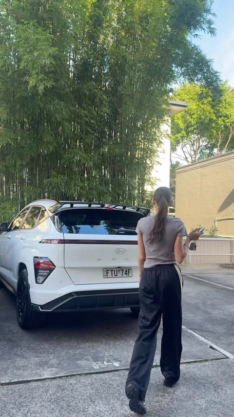 Instagram post by @coconutandbliss for Hyundai Worldwide. Caption reads: Sunday reset with me and my @hyundaiaus Kona EV....