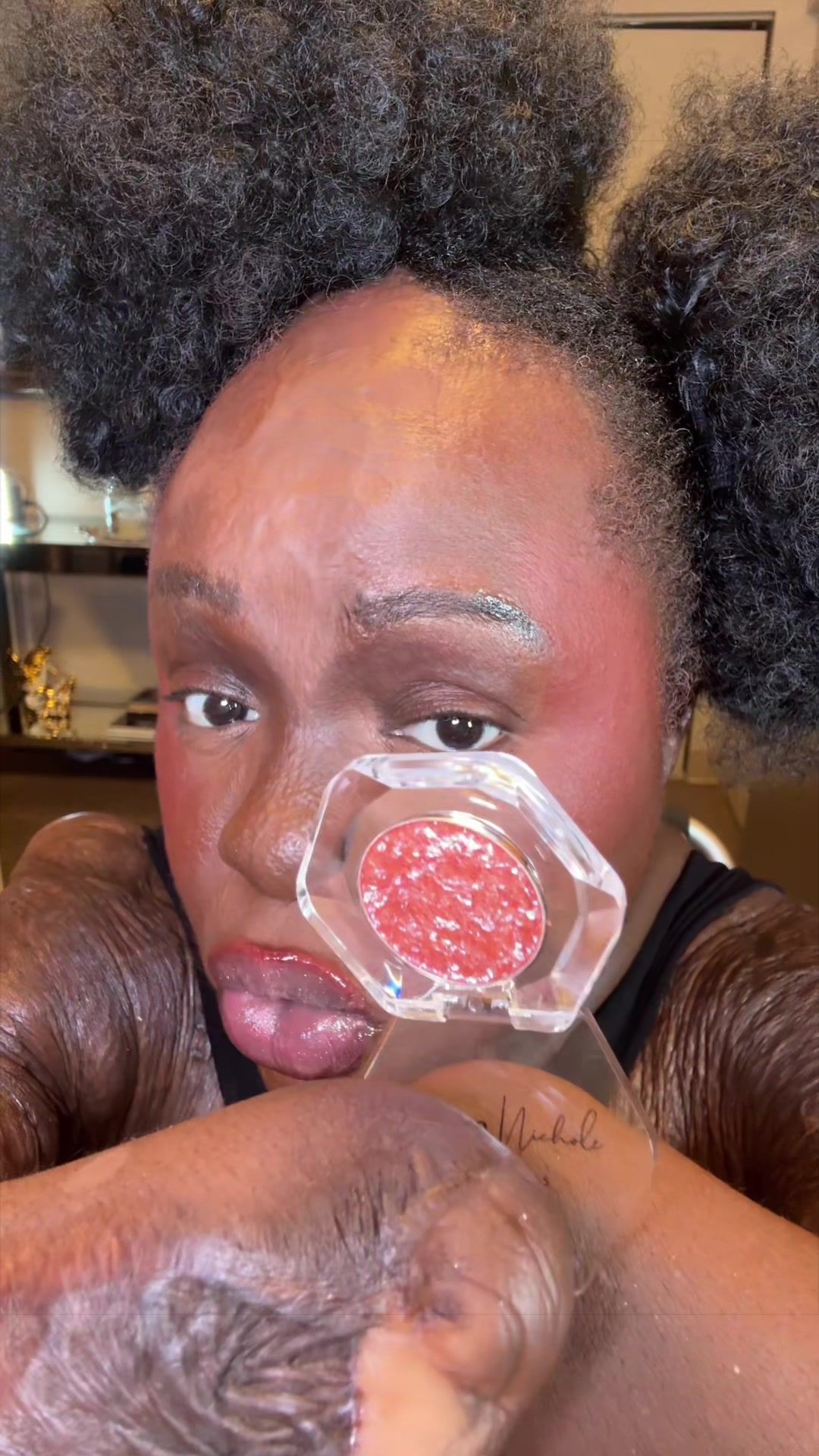 TikTok post by @sasha_british for Adriana Nichole Cosmetics. Caption reads: [...] and glide on Like butter 💚 @@Adriana....