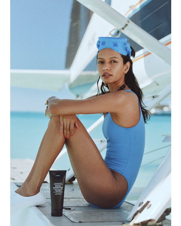 Instagram post by @janithanperera for Mecca Cosmetica. Caption reads: happiest by the ocean 🌊 @meccacosmetica....