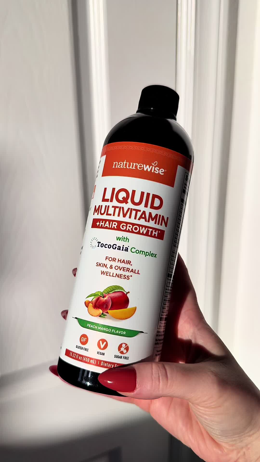 TikTok post by @morguehigdon for NatureWise. Caption reads: @NatureWise liquid multi + hair growth?! yesssss!....