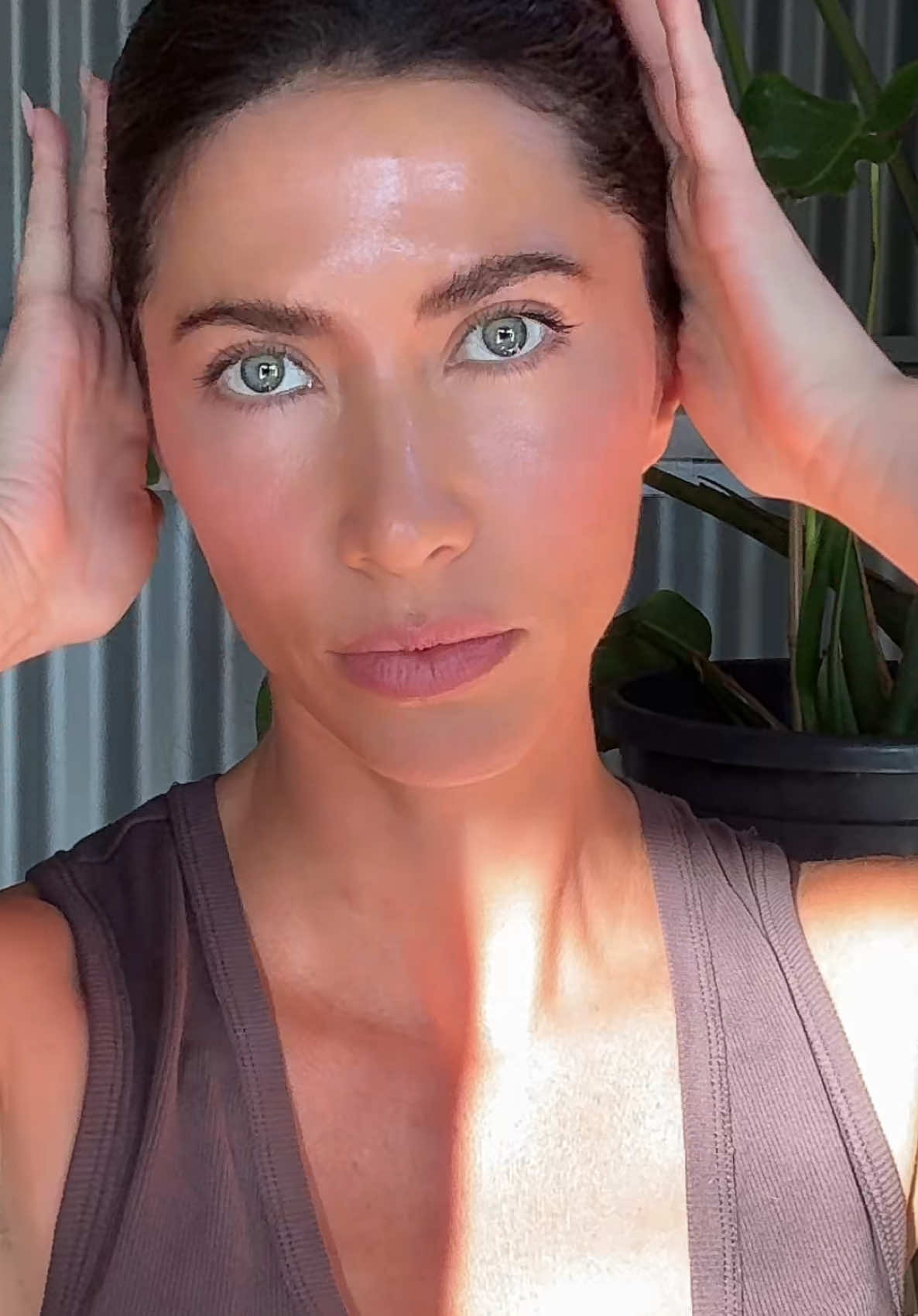 TikTok post by @emilykatearmato for DearDahlia. Caption reads: [...] using only 3 products 🪻 @Dear Dahlia USA ....