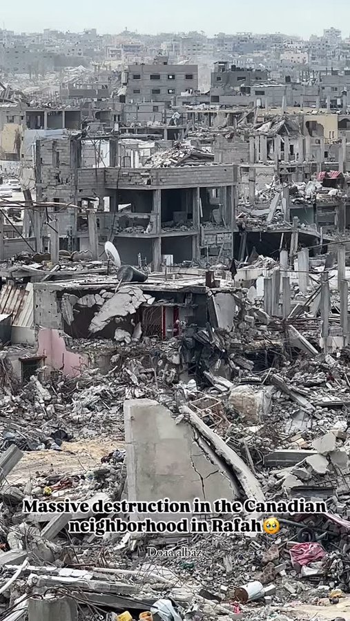 Instagram post by @_doaa_mohammad for Wear The Peace. Caption reads: Massive destruction in the Canadian neighborhood....