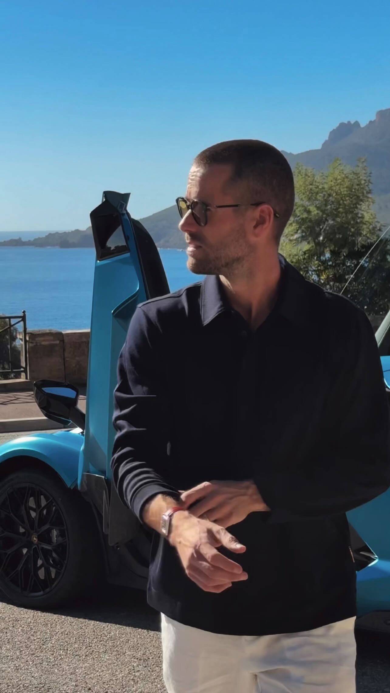 Instagram post by @tge for Lamborghini. Caption reads: [...] time celebrating @orlebarbrown x....