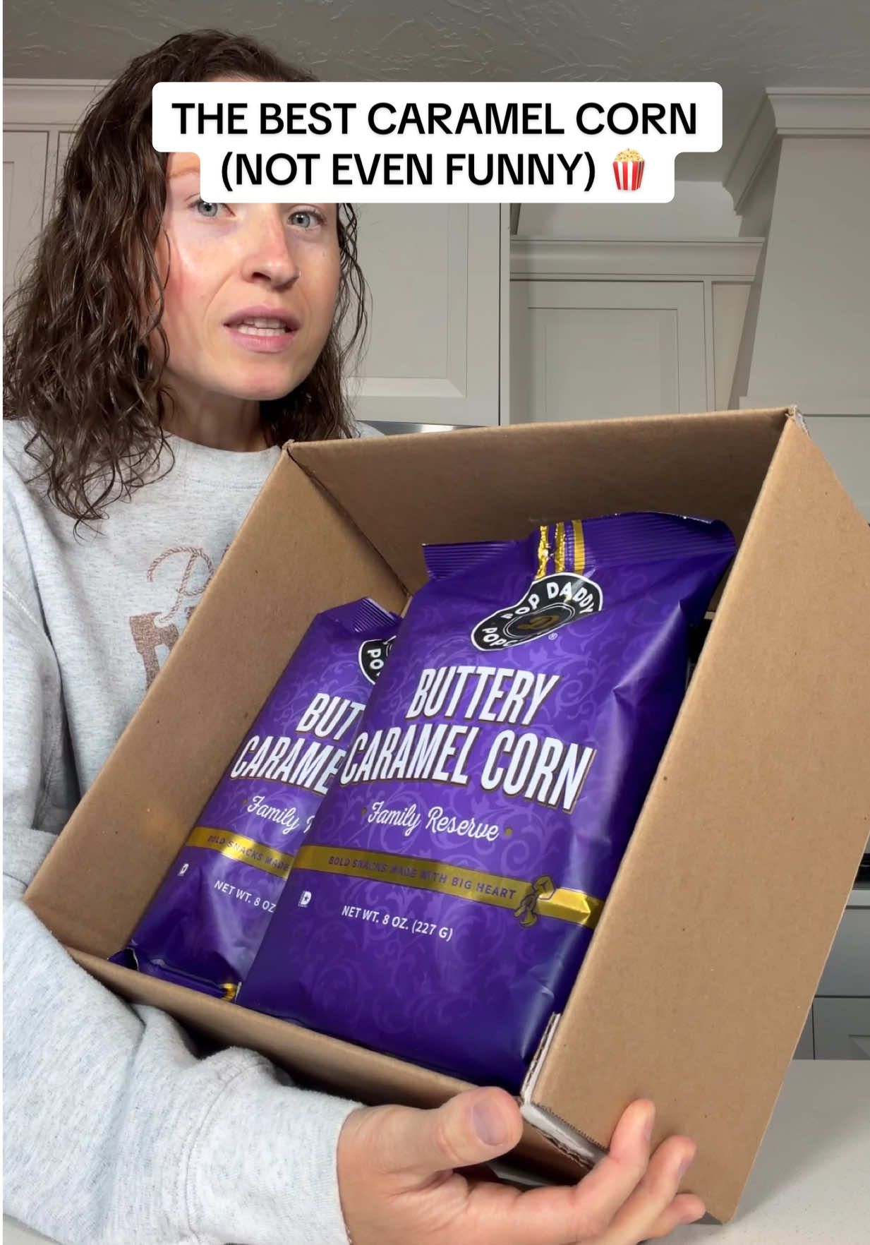 TikTok post by @morganchompz for Popdaddy Snacks. Caption reads: [...] believe in caramel corn again fr 🍿....