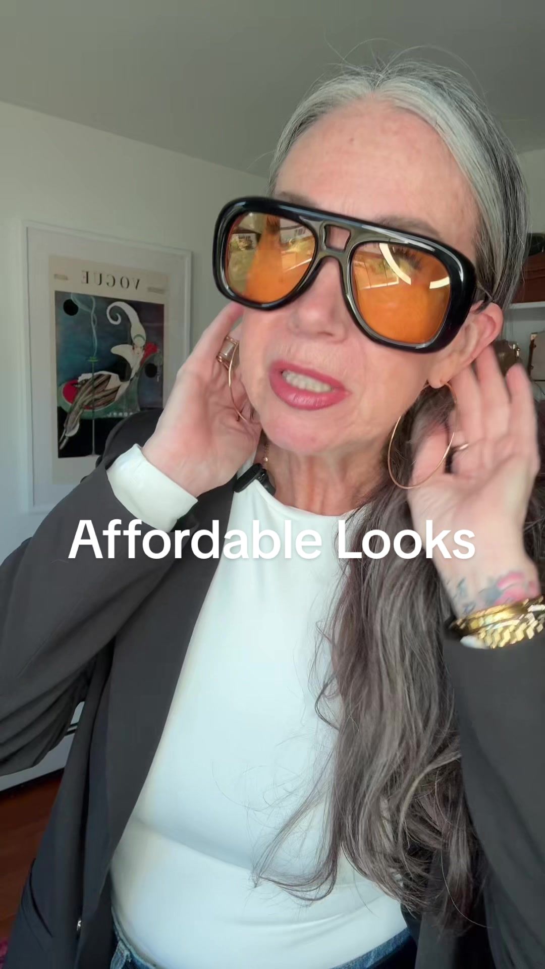 TikTok post by @aestheticaleestyled for DEZI. Caption reads: [...] women  @Gap @modern and chic @DEZI EYEWEAR....