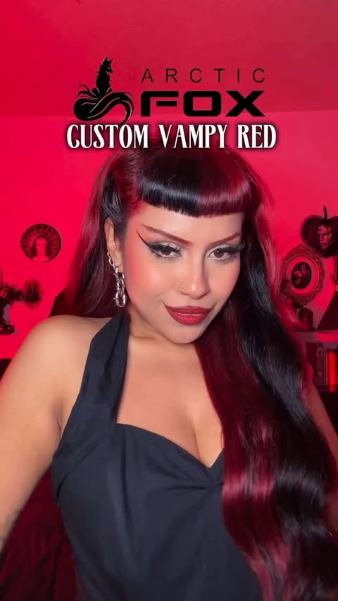 Instagram post by @andreadreaam for Arctic Fox Hair Color. Caption reads: [...] Vampy Red 🦇 I love that @arcticfoxhaircolor....