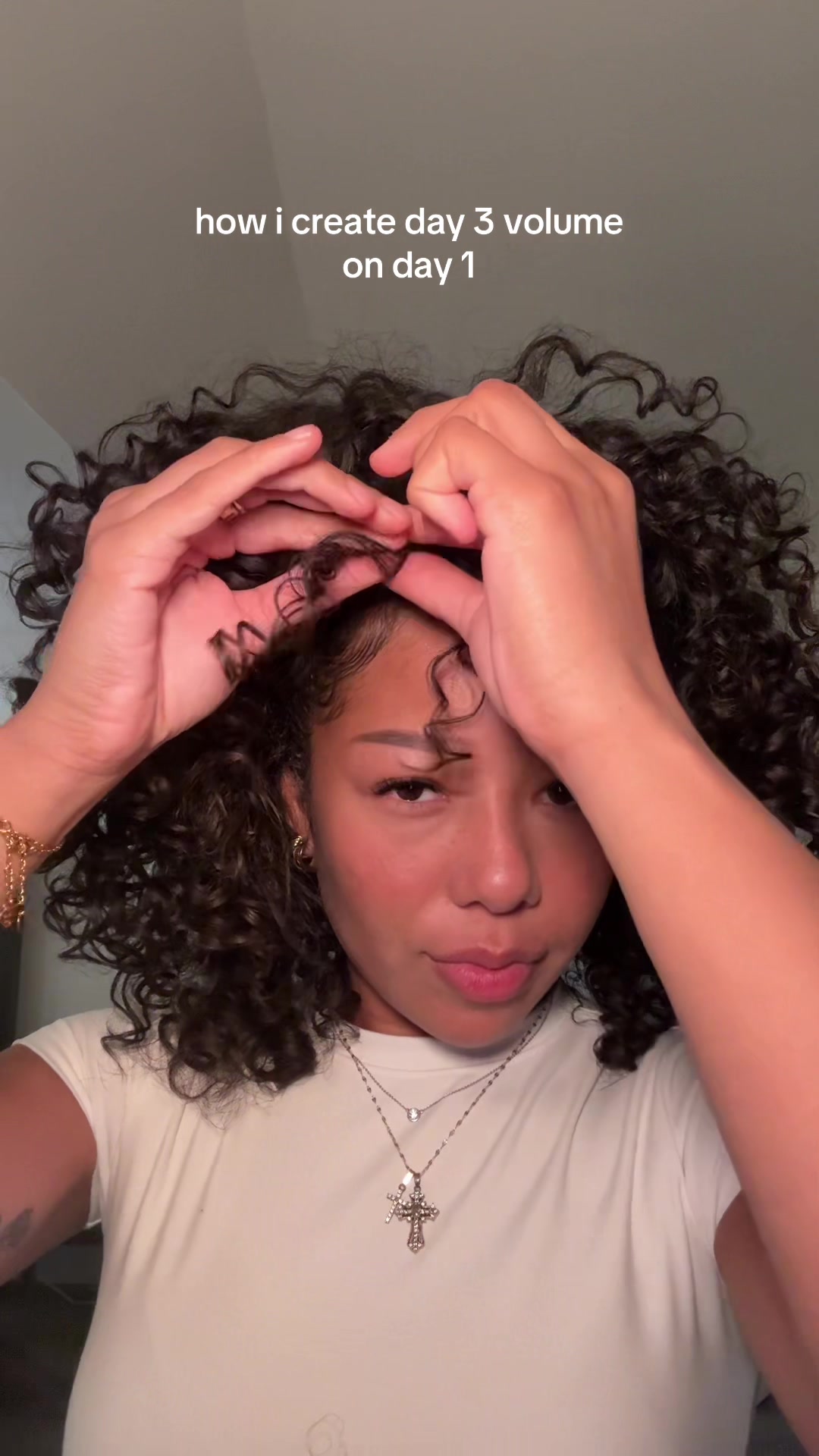 TikTok post by @1enelle for Aussie Hair. Caption reads: Creating voluminous curls w @Aussie Hair USA 🫣💕 ....