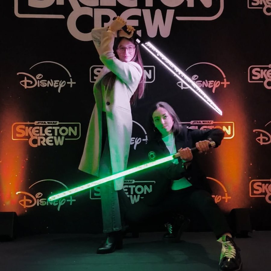 Instagram post by @lightsabertime for KenJo Sabers. Caption reads: Me & @the_womandalorian with lightsabers from'our....