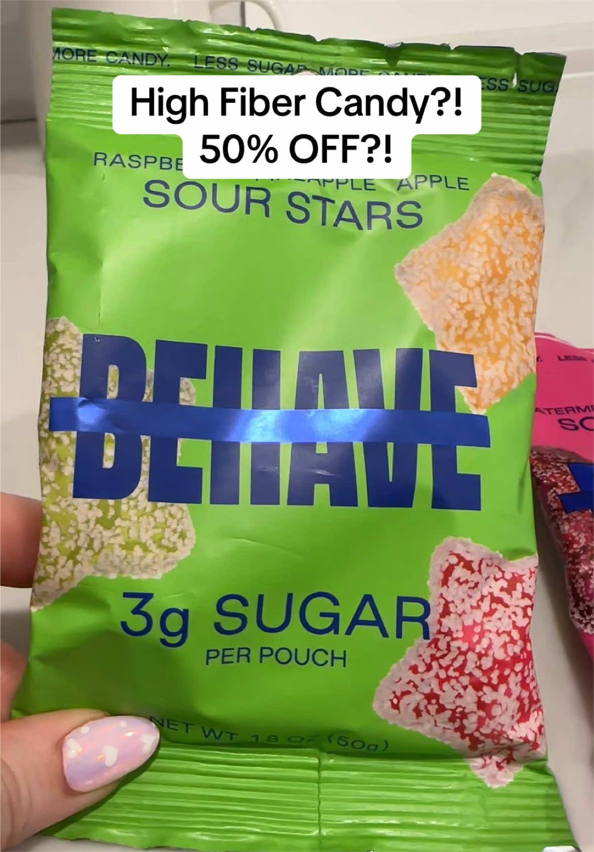 TikTok post by @heytina_xox for BEHAVE. Caption reads: Fiber hack with a sour twist!! @BEHAVE Candy....
