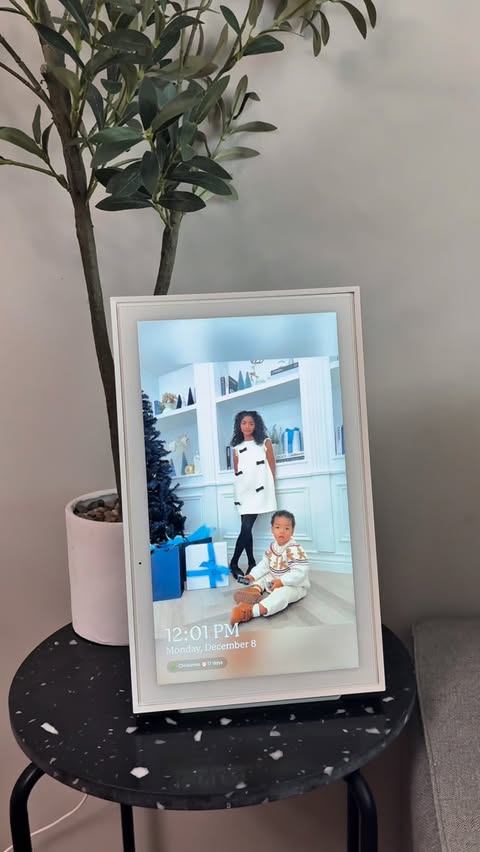 Instagram post by @muvacass for Skylight Frame. Caption reads: Life gets busy—especially with a family—but....