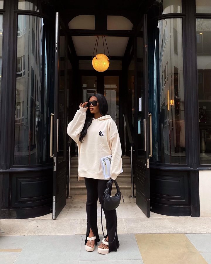 Instagram post by @thinklikekandie for Skinnydip London. Caption reads: Outfit to match the weather 🕶 @skinnydiplondon....