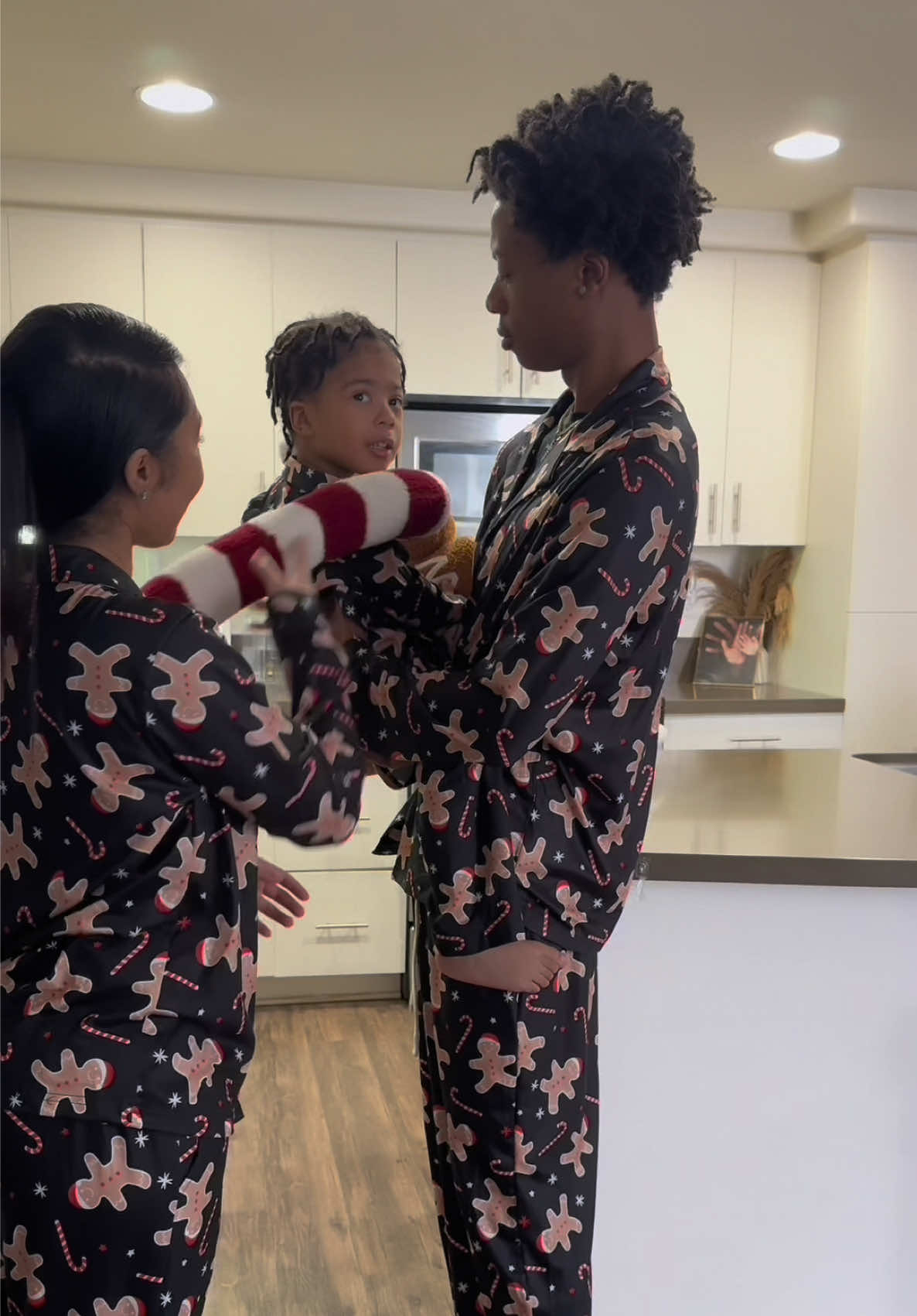 TikTok post by @deandkitv for PatPat. Caption reads: a year's difference but still rocking matching....