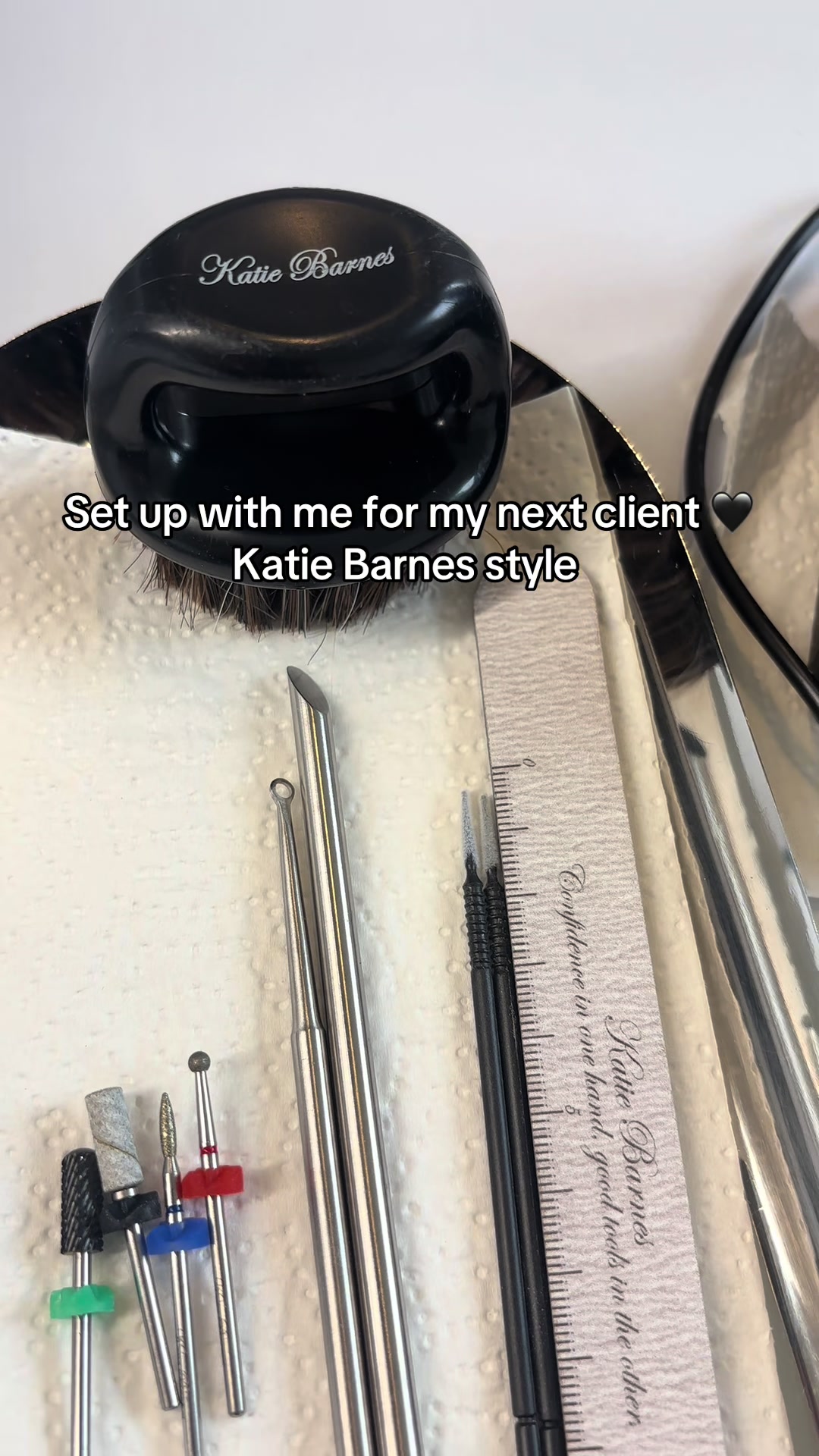TikTok post by @catherinewestjones for Katie Barnes Tool Range. Caption reads: [...] and getting products out 🖤 @Katie Barnes....