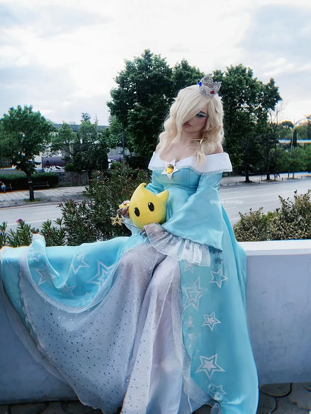 Instagram post by @cute.monster for Miccostumes. Caption reads: [...] me ⋆.𐙚 ̊ Costume/Wig/Crown gifted by....