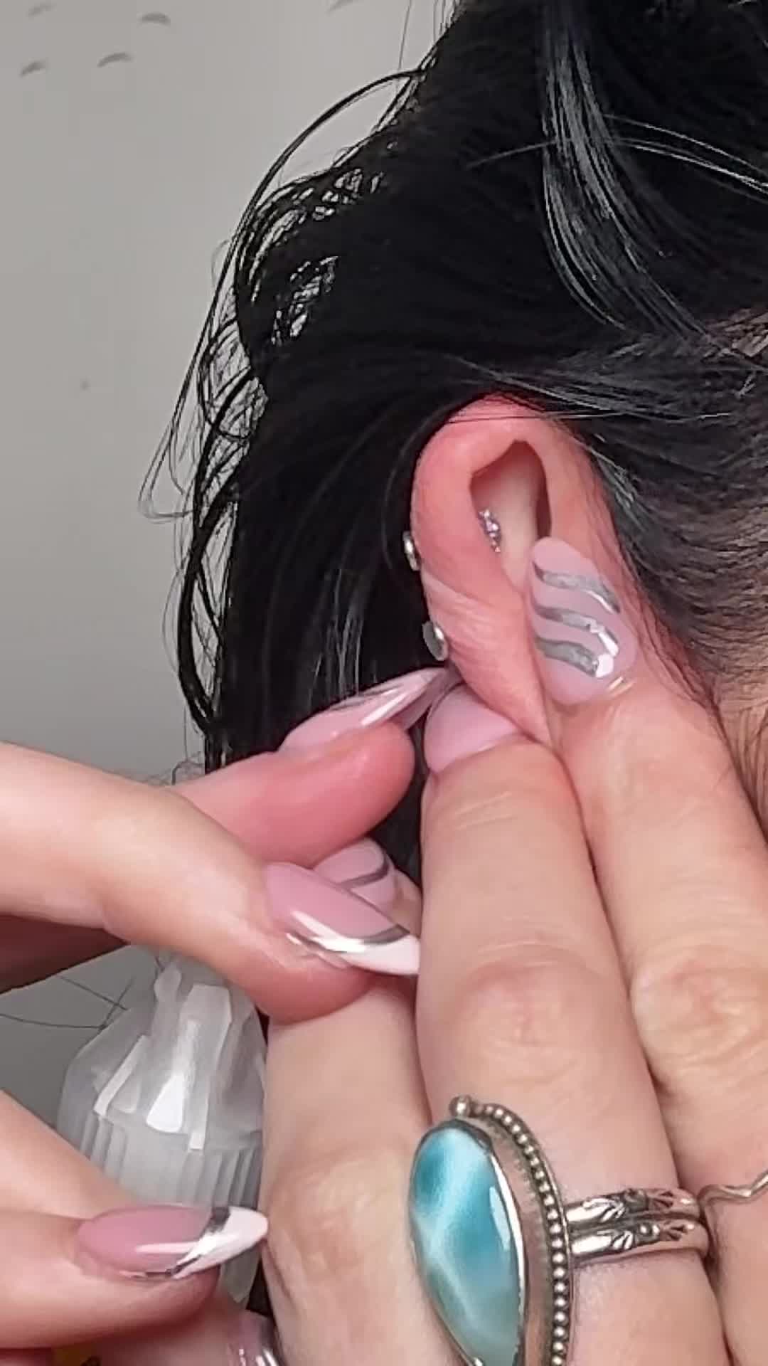 TikTok post by @sage_burress for Base Laboratories. Caption reads: [...] bump ✌️ (this saved my piercing!) @Base....