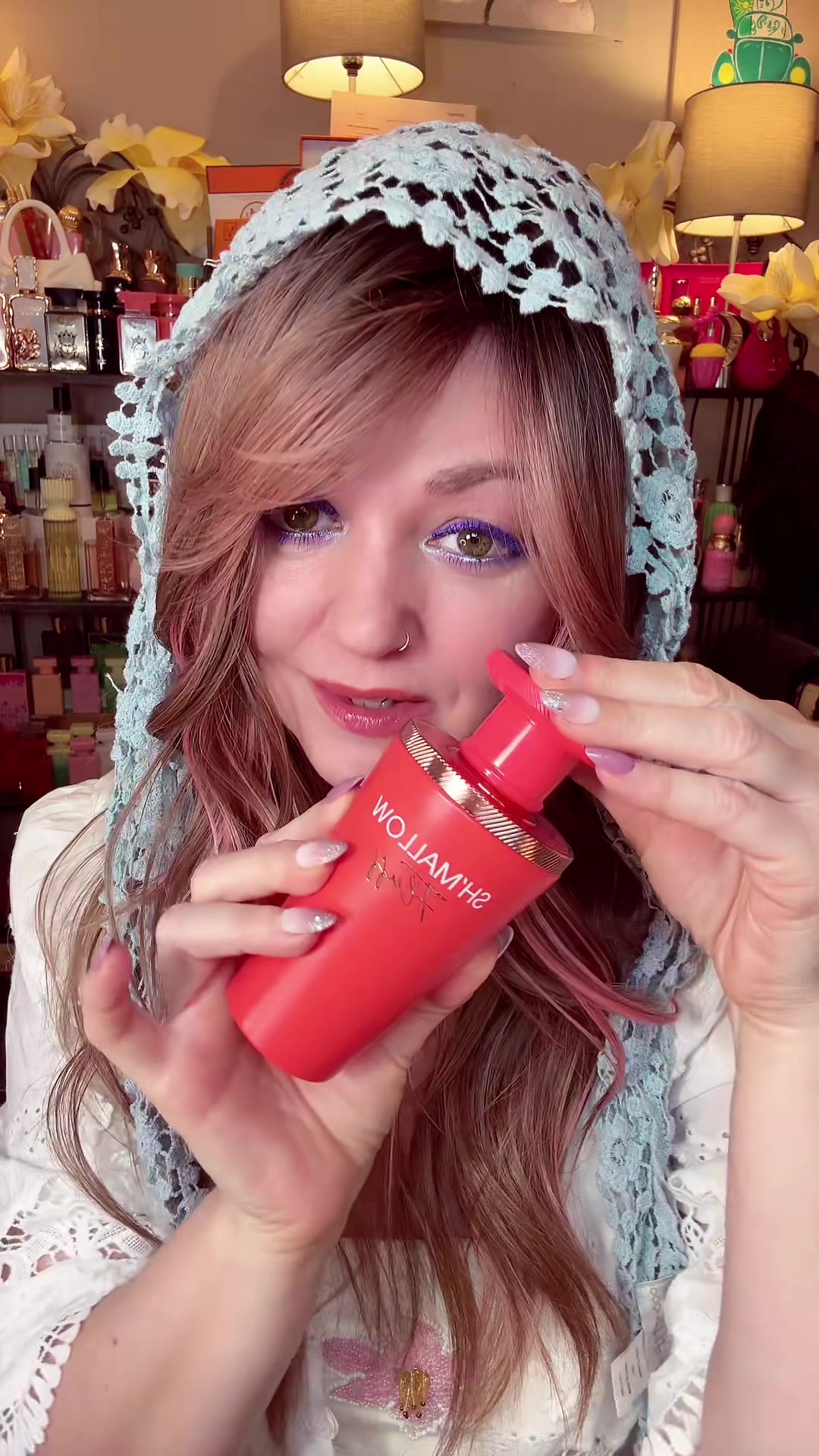 TikTok post by @tinadaniels04 for Oudware. Caption reads: @Oudware #SummerVibes #perfume #fragrance [...].