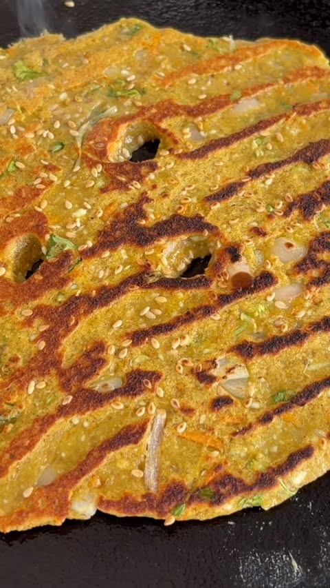 Instagram post by @shemusttry for Fortune Foods. Caption reads: This High-Protein, High-Fibre Thalipeeth is....