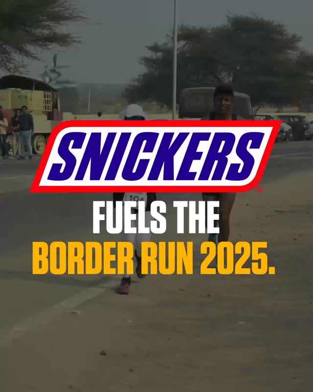 Instagram post by @thehellrace for Snickers. Caption reads: This time, hunger meets heroism.
Snickers is proud....