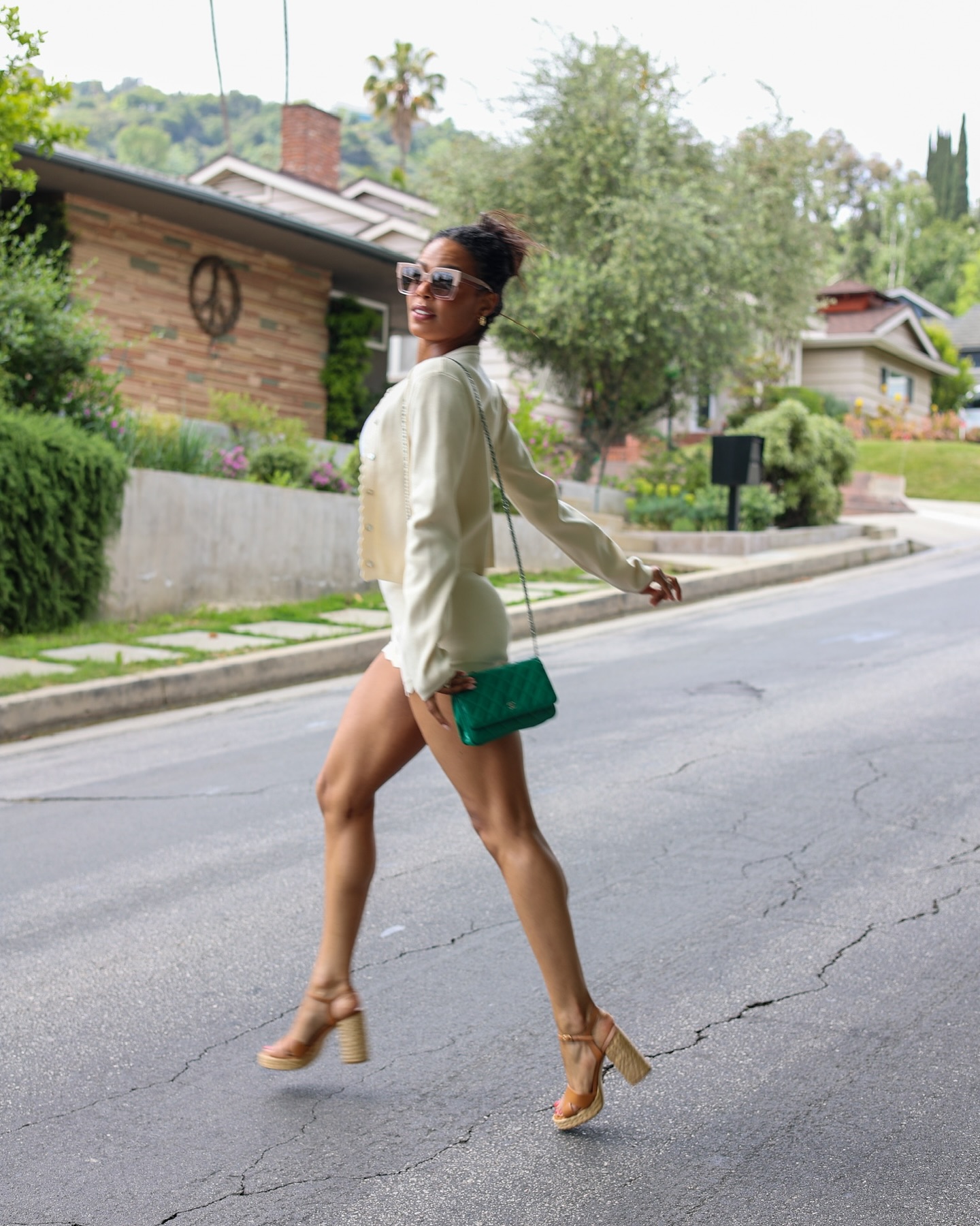 Instagram post by @brittbenae for STUART WEITZMAN. Caption reads: ✨🌷 Stepping into Spring with @stuartweitzman....