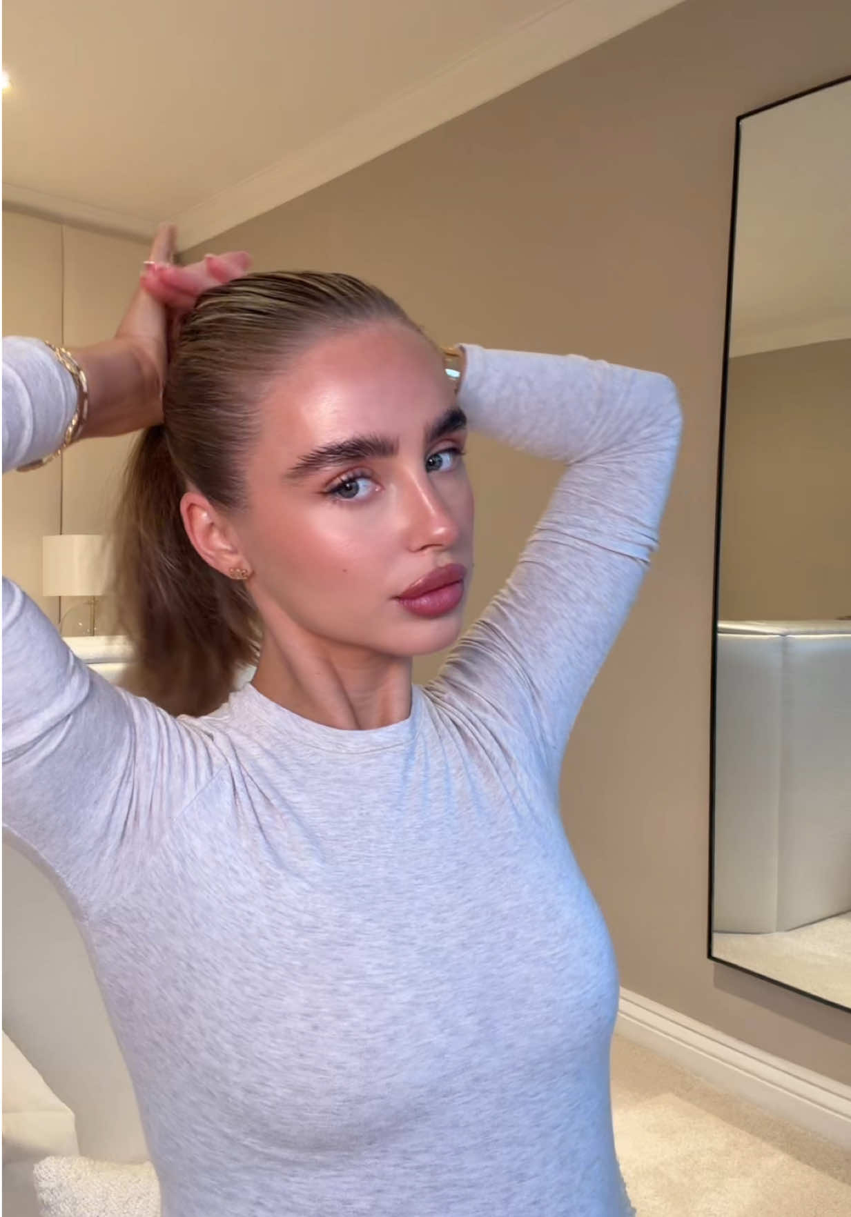 TikTok post by @megancooney4 for BeautyWorks. Caption reads: Sleek pony - Using my favourite....