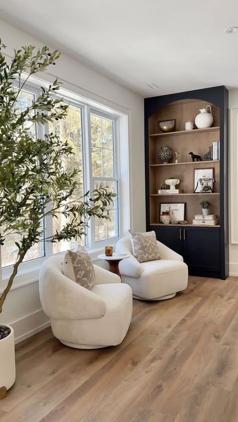 Instagram post by @melissa_janzso_designs for The Brick. Caption reads: [...] Swivel Accent Chair - @brickwarehouse....