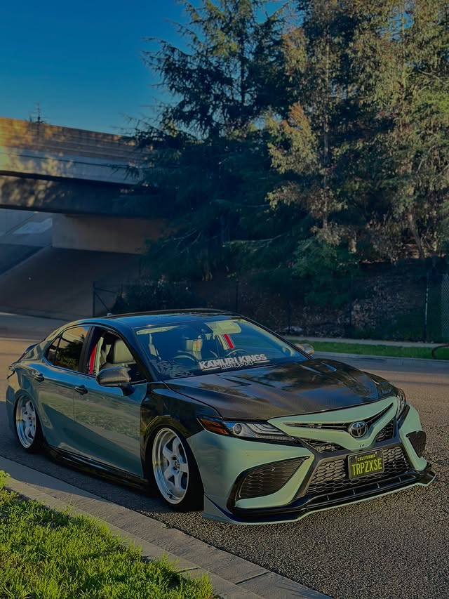 Instagram post by @g8camry for TTABC. Caption reads: [...] Front lip @kingofcarbonfiber Taillights....