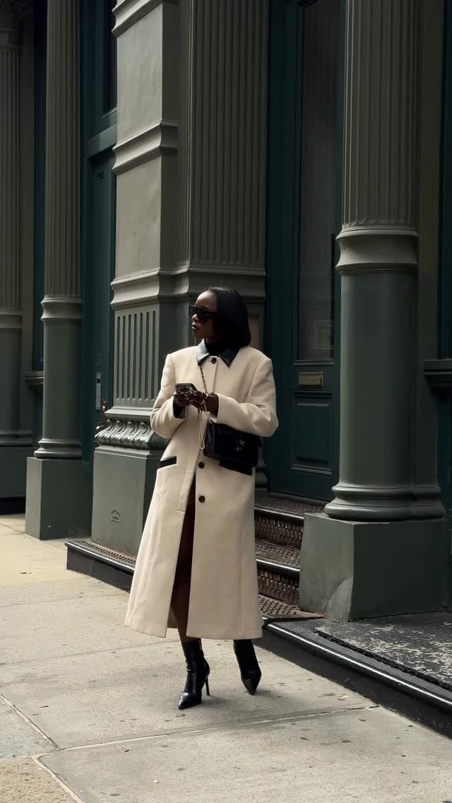 Instagram post by @coco_floflo for Karen Millen. Caption reads: My coat obsession continues🩶, Newyork Vlog is now....