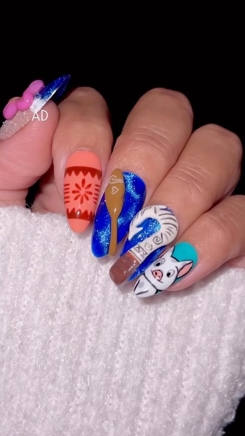 Instagram post by @nailartbyjen for Disney Animation. Caption reads: [...] #disneynails #moananails @disney....