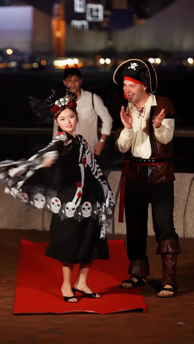 Instagram post by @andrejko.epta for Discover Hong Kong. Caption reads: Trick, treat, and slay in Hong Kong🕷️🔥

Do you....