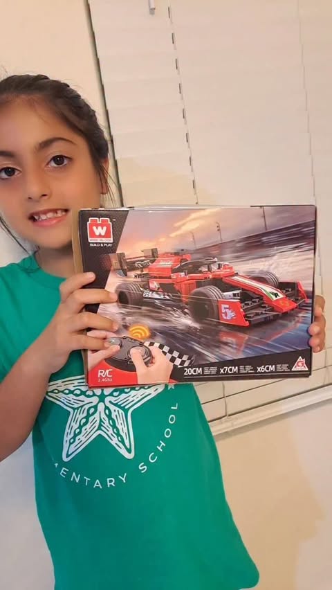 Instagram post by @producttesterreviewer for Alpha Toys. Caption reads: Looking for building toys for kids holiday gifting....