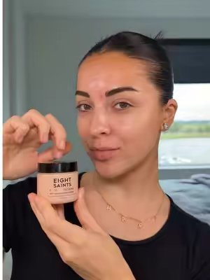 TikTok post by @thedailyposh for Eight Saints Skincare. Caption reads: Don’t let your skincare stop at your face 🤍 Neck....